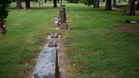 Flowers on a headstone Stock Footage 93622927