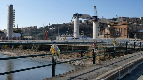 Flowers in honor for the dead of the Morandi bridge collapsed in Genoa Stock Footage