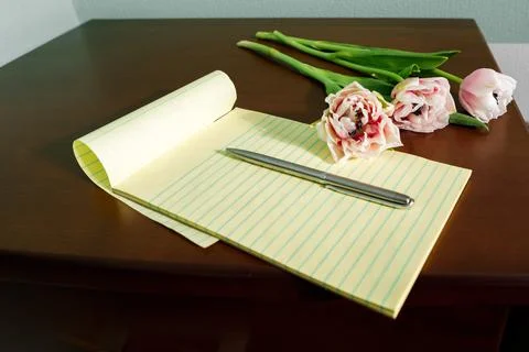 Flowers notepad and coffee on the table. valentine's day concept Stock Photos