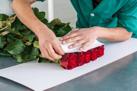 Flowers packaging process Stock Photos