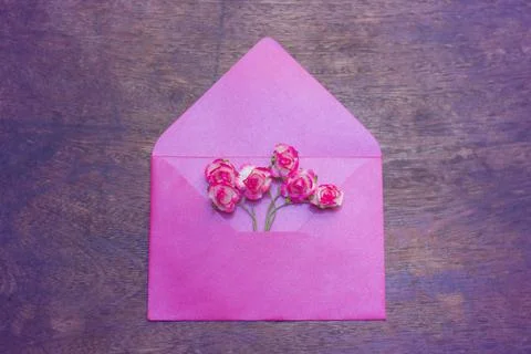 Flowers in a pink envelope 写真素材
