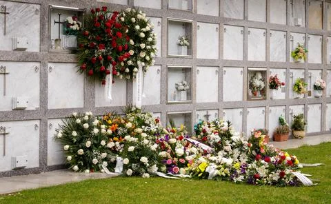 Flowers placed in front of a grave in La Coruna, Spain Stock Photos
