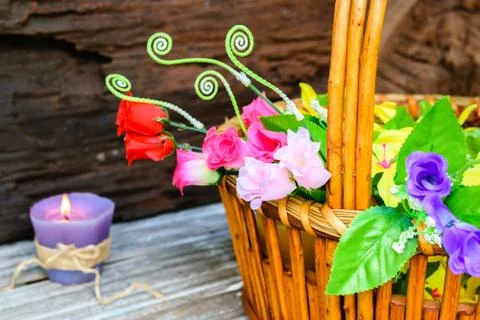 Flowers plastic in a basket Stock Photos
