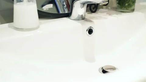 Flowers on the sink Stock Footage 51162384