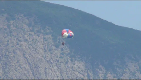 Flowers, skydiver, mountain 스톡 동영상 29654643