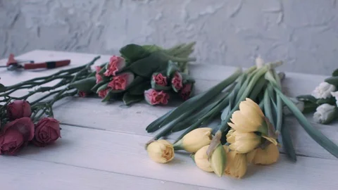 Flowers on table Stock Footage 128138755