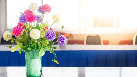 Flowers on a table in the library Stock Photos