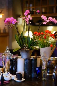 Flowers on the table in a restaurant Stock Photos