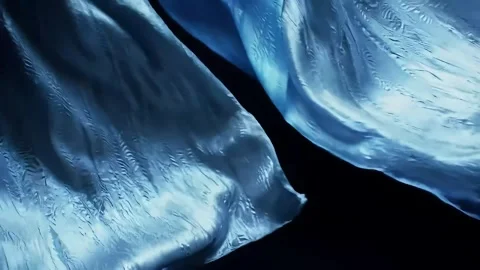 Flowing Blue Fabric Slow Motion on Dark Background Stock Footage 313324271