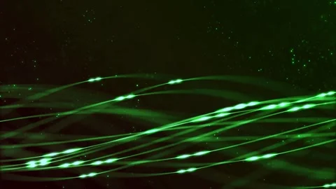 Flowing bright green light traces create abstract futuristic background Stock Footage 327571887