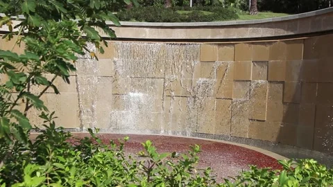 A flowing cascading waterfall on a wild stone wall Stock Footage 160951337
