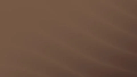 Flowing chocolate waves with smooth textures and warm brown tones Stock Footage 315268206