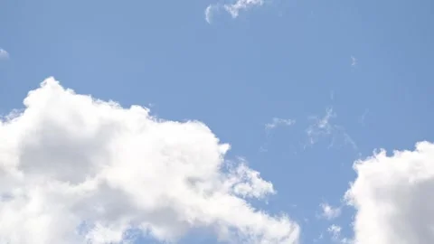 Flowing cloud bands crossing open sky in atmospheric timelapse Stock Footage 343068683