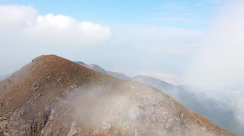 Flowing Clouds in Mountains. 4K Ultra HD 3840x2160 Video Clip Stock Footage 59561017