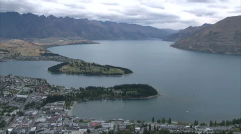 Flowing clouds over Queenstown bay Stock Footage 44668620