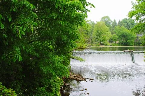 A flowing dam. Stock Photos