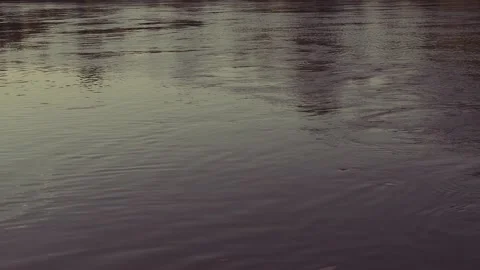 Flowing dark river water with waves Stock Footage 135531250