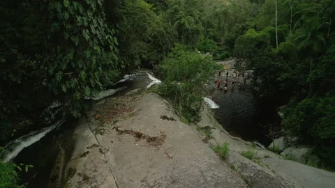 Flowing down Waterfall, With Tourists Below, Paraty Brazil, 4k Stock Footage 239558626