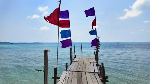Flowing flags against sea scape background. Stock Footage 273771292