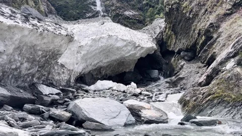 Flowing glacier stream inside an ice cave, New Zealand. Stock Footage 343840197