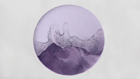 Flowing glitter waving surface. Mixing alcohol ink in a circle on a white Stock Footage 219926425