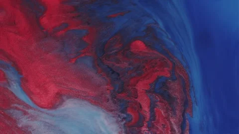 Flowing ink fluid stream pigment texture particles Video stock 314998739