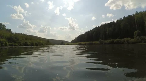 Flowing on kayak down the river Stock Footage