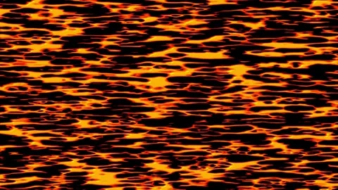 Flowing lava creates mesmerizing patterns at an active volcano during the nig Stock Footage 332846589