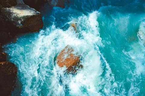 Flowing mountain river Stock Photos