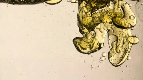 Flowing Oil Slow motion Extremely Closeup light background Stock Footage 103271399