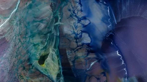 Flowing patterns of alcohol ink mixed with epoxy resin in art Stock Photos
