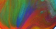 Flowing Rainbow Tie-Dye Liquid, Blue Green And Orange Stock Footage