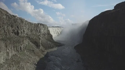 Flowing river and waterfall falling from cliff in Iceland Stock Footage 69741068