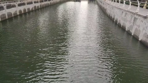 Flowing River in the Heart of the City Video stock 335511488