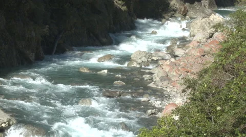 Flowing River, Midday Pan Shot Stock Footage 63863974