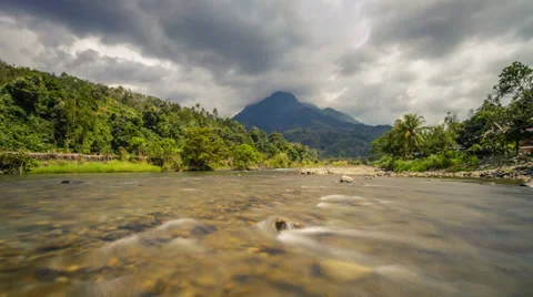 Flowing River With Mountain And Moving Cloud Zoom Out Video stock 36444828