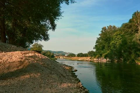 Flowing river at sunset Photos