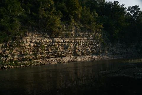 Flowing river at sunset 写真素材