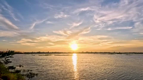 Flowing River at Sunset, Riverside Sunset Video, River View at Sunset, Suns.. Video stock 250434707