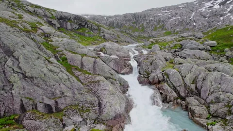 Flowing river through rocky landscape Video stock 330164578