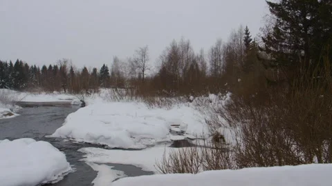 Flowing River Through Snowy Forest Landscape in Southern Urals, Russia Stock Footage 325474736