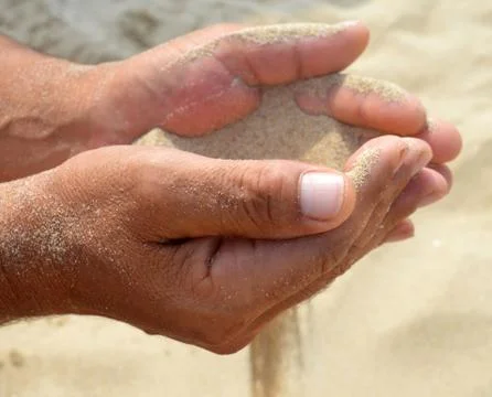 Flowing sand Stock Photos