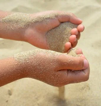 Flowing sand Stock Photos