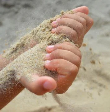 Flowing sand Stock Photos