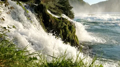 Flowing side stream of Rheinfall with smooth camera motion, 4K Stock-Footage 320157418