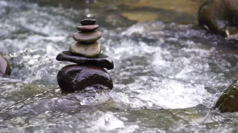 Flowing small stream with Zen stone Video stock 52979984