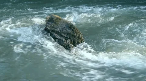 Flowing stream of brook washes stone Stock-Footage 7740704