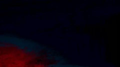 Flowing transitions from saturated red to deep blues. The movements appear Video stock 308923940