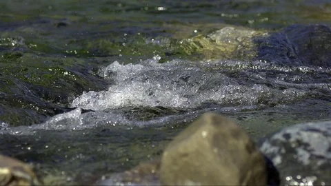 Flowing water and waves in slow motion Stock Footage 77453632