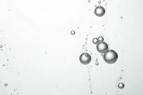 Flowing water bubbles Stock Photos